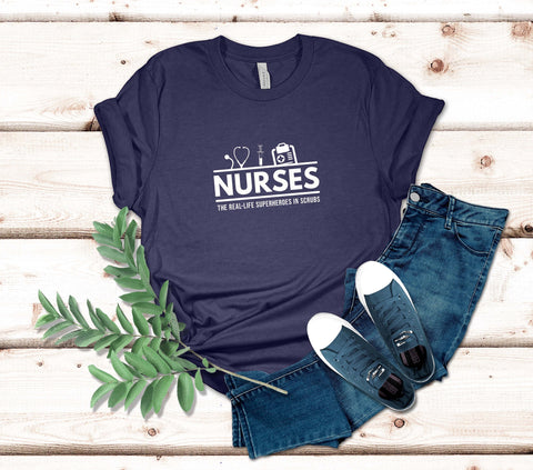 Image of Nurse the Real-Life Superheroes in Scrubs T-Shirt | Perfect Gift Idea for Nurses