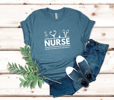 Image of Nurse We Can't Fix Stupid, But We Can Sedate It T-Shirt | Gift for Nurses
